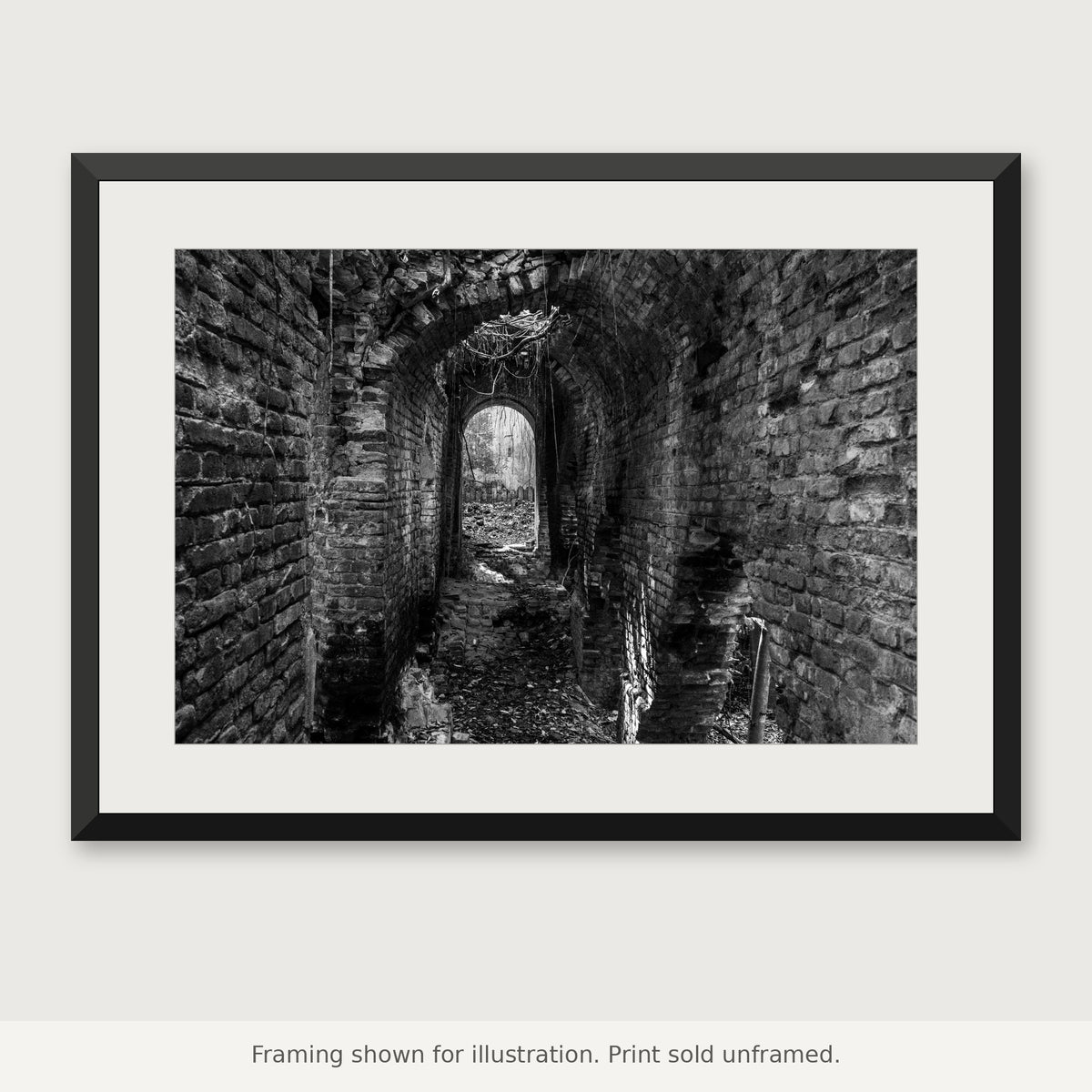 Arched Passage at Playa Grande black-and-white photograph shown in a frame. Print sold unframed.