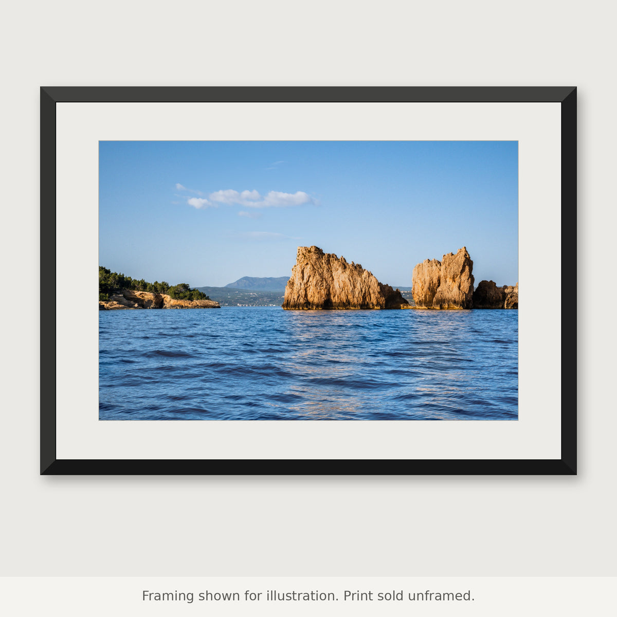 Navarino Sea Stacks fine art photograph shown in a frame. Print sold unframed.