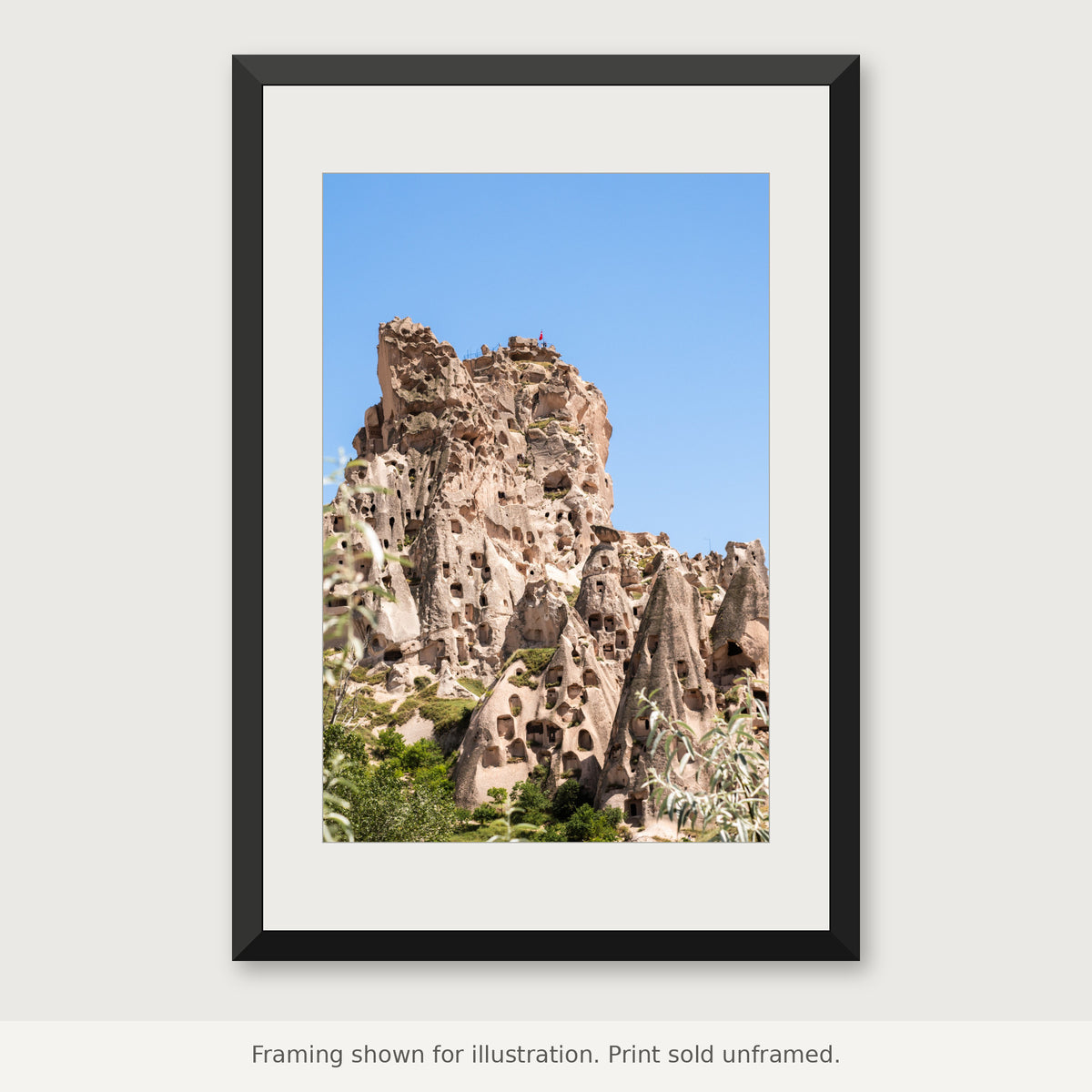 Uçhisar Rock Dwellings fine art photograph shown in a frame. Print sold unframed.
