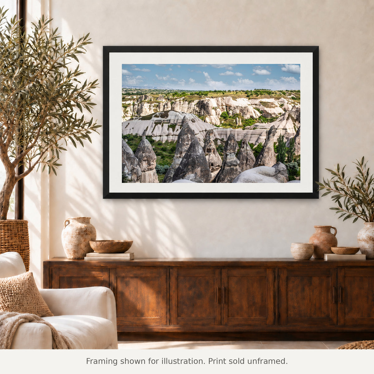 Framed Fairy Chimneys of Göreme photograph displayed in an interior setting. Print sold unframed.