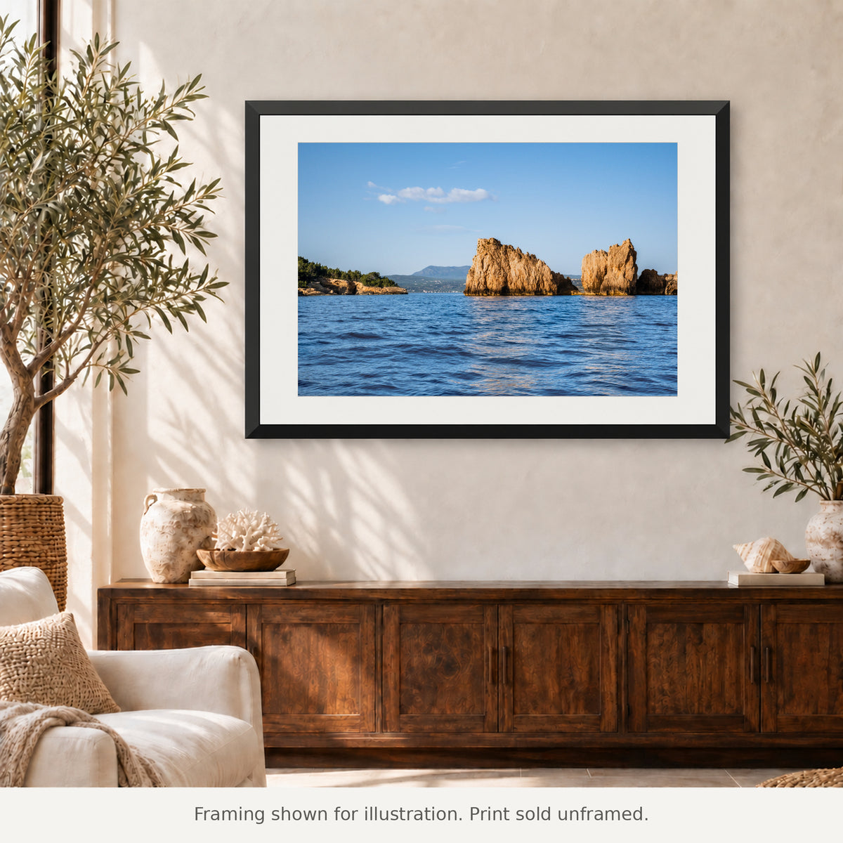 Framed Navarino Sea Stacks photograph displayed in an interior setting. Print sold unframed.