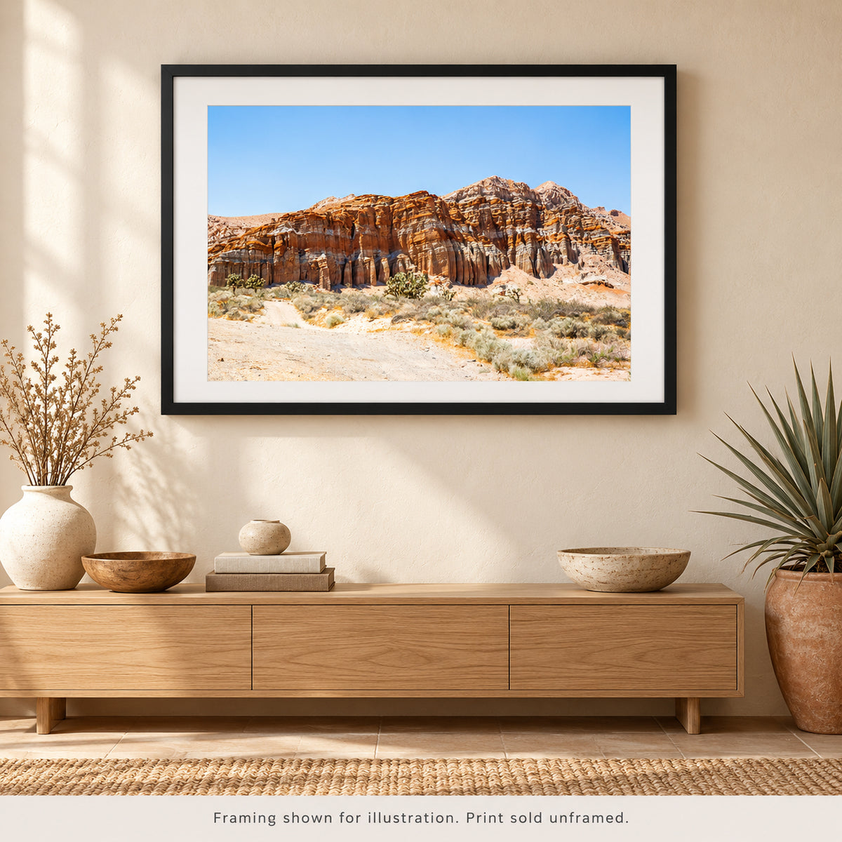 Framed Red Rock Cliffs of the Southwest photograph displayed in a Southwest-inspired interior setting. Print sold unframed.