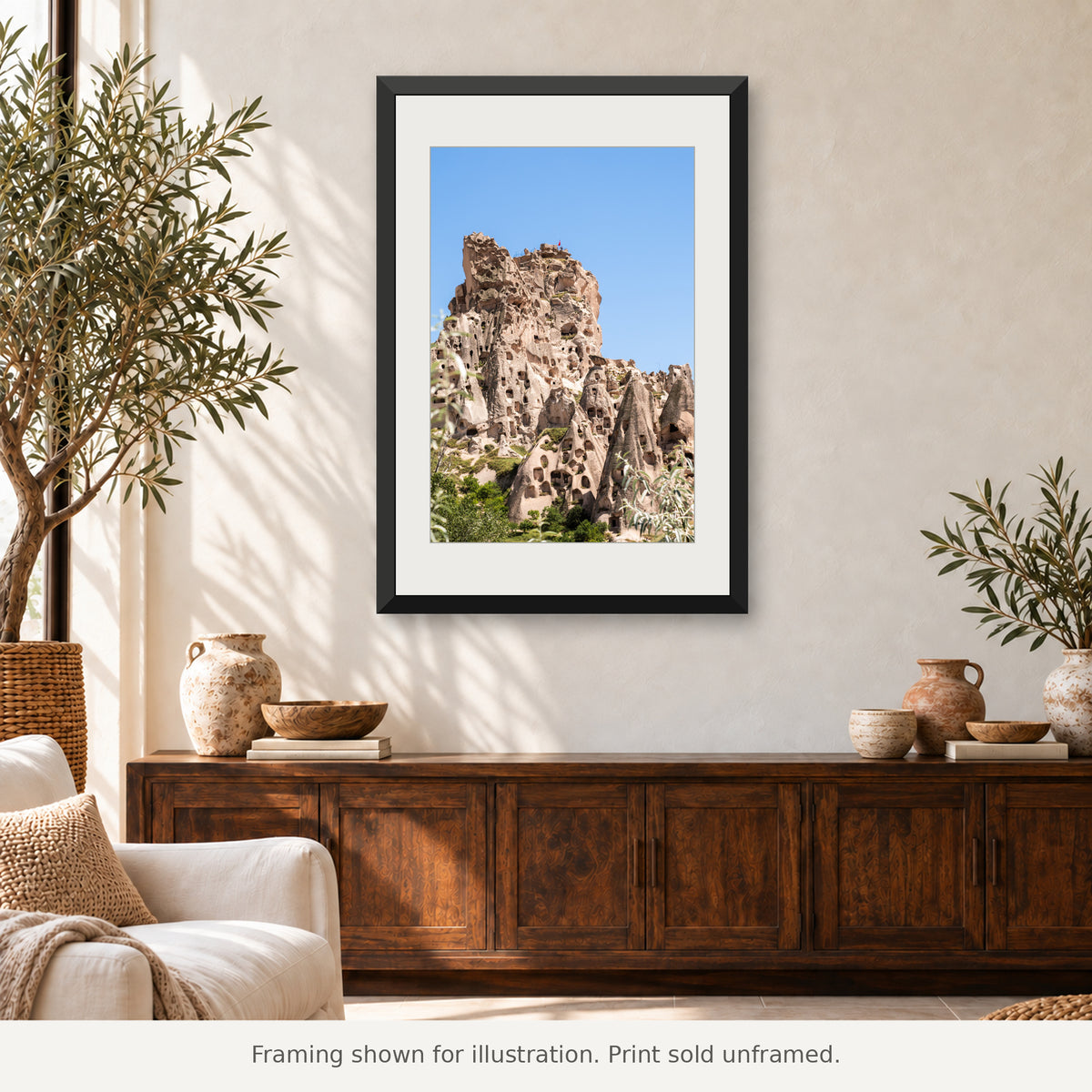 Framed Uçhisar Rock Dwellings photograph displayed in an interior setting. Print sold unframed.