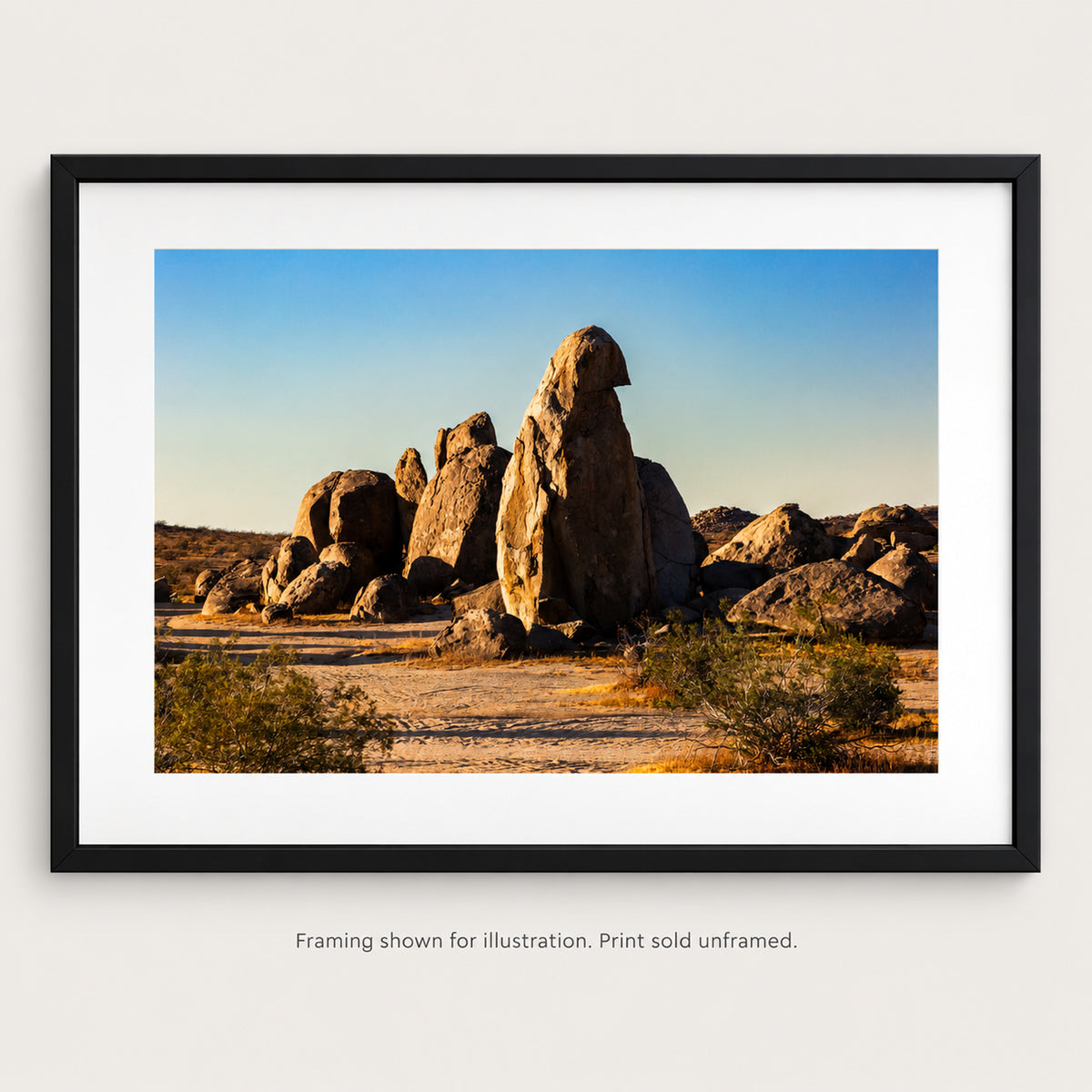 Golden Light on Desert Boulders photograph shown in a frame. Print sold unframed.
