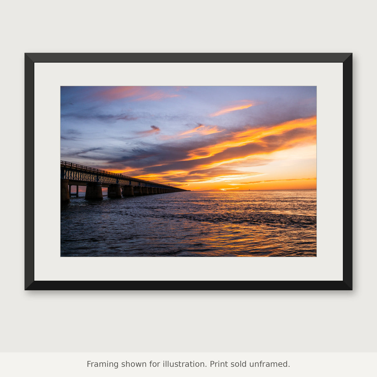 Seven Mile Bridge at dusk in the Florida Keys, displayed in a black frame with a white mat. Print sold unframed.