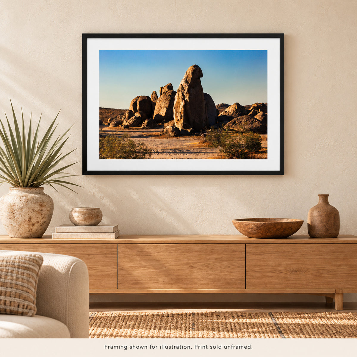 Framed Golden Light on Desert Boulders photograph displayed in a Southwest-inspired interior setting. Print sold unframed.