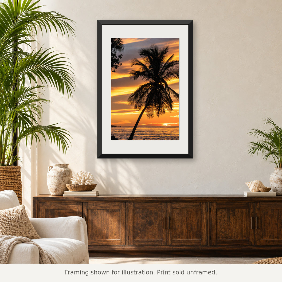 Lone palm tree silhouetted against glowing orange and pink sunset clouds in the Florida Keys. Print sold unframed.