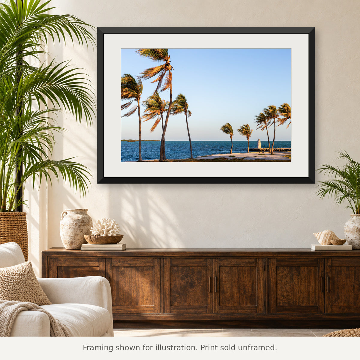 Palm trees framing a small harbor beacon beside blue water in Marathon, Florida Keys. Print sold unframed.
