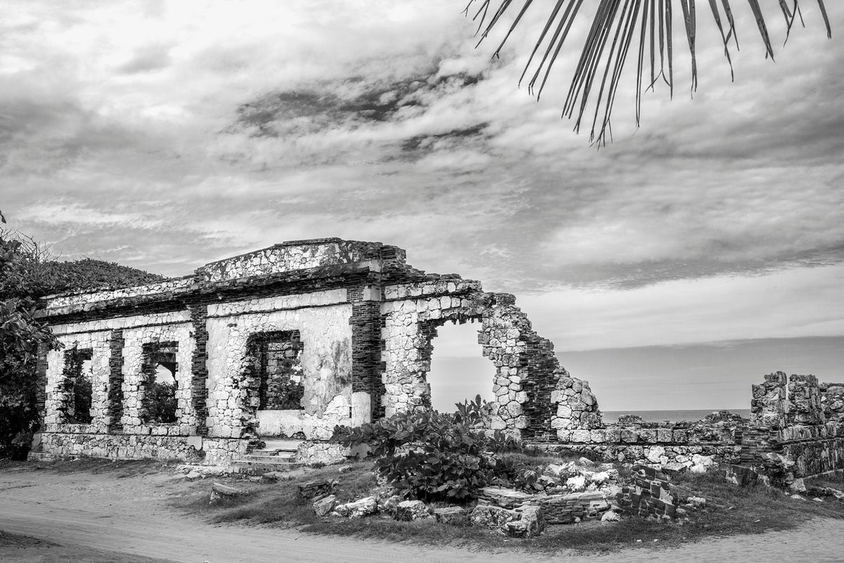 Black-and-white photograph of the Punta Borinquen Lighthouse ruins in Aguadilla, Puerto Rico.
